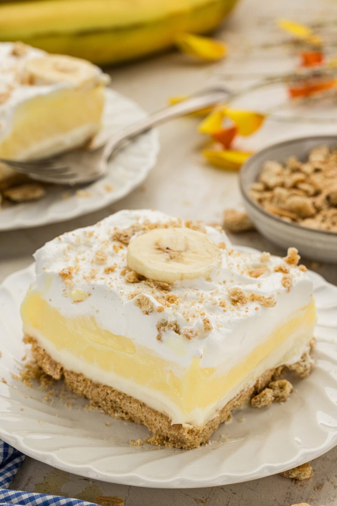 slice of Banana Cream Lush on a white plate