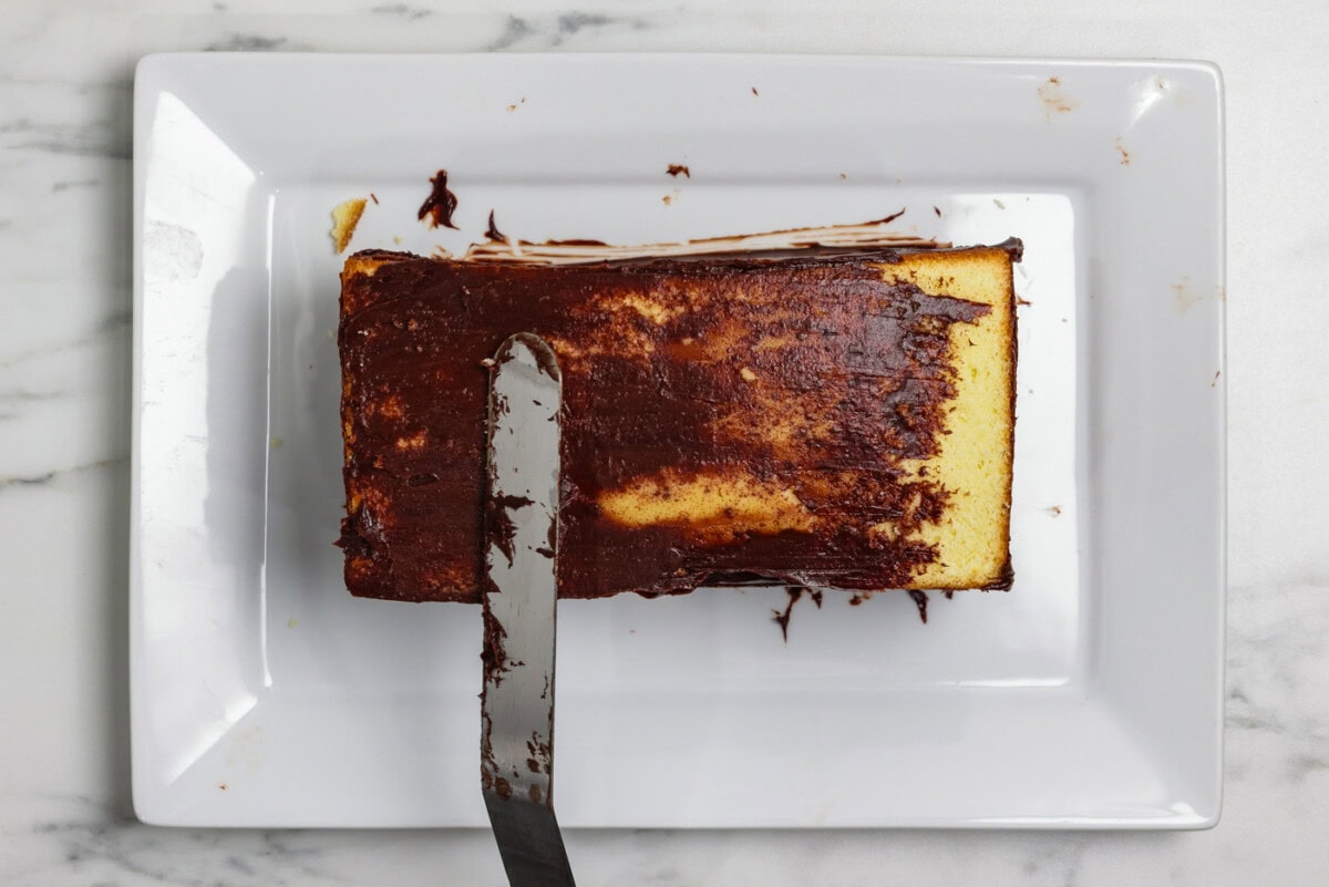 spreading crumb coat on Cassata Cake