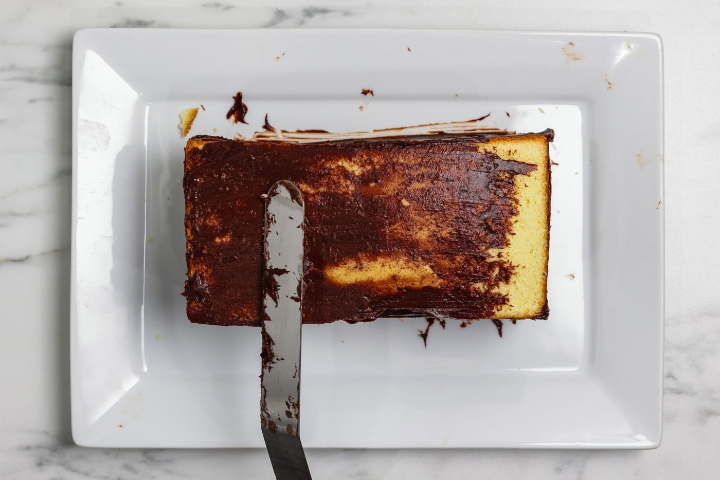 spreading crumb coat on Cassata Cake