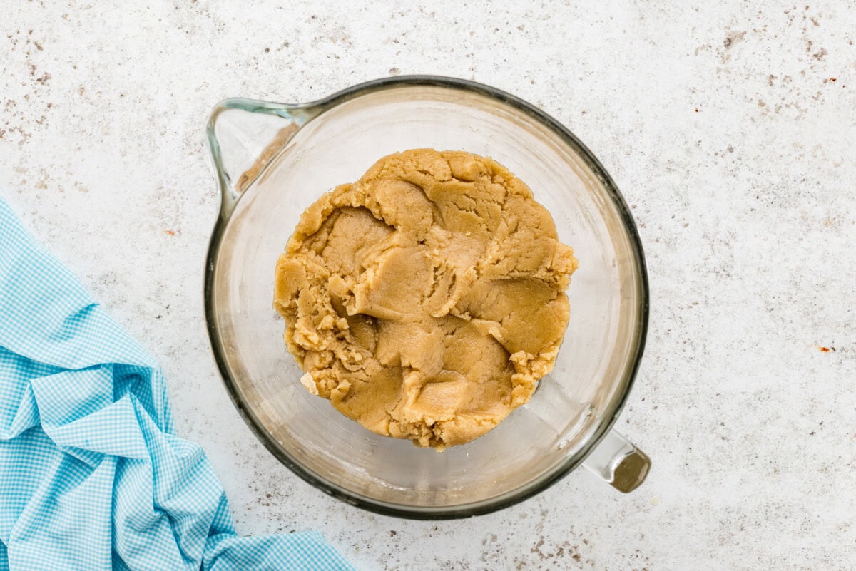 Thick cake batter in a stand mixer bowl