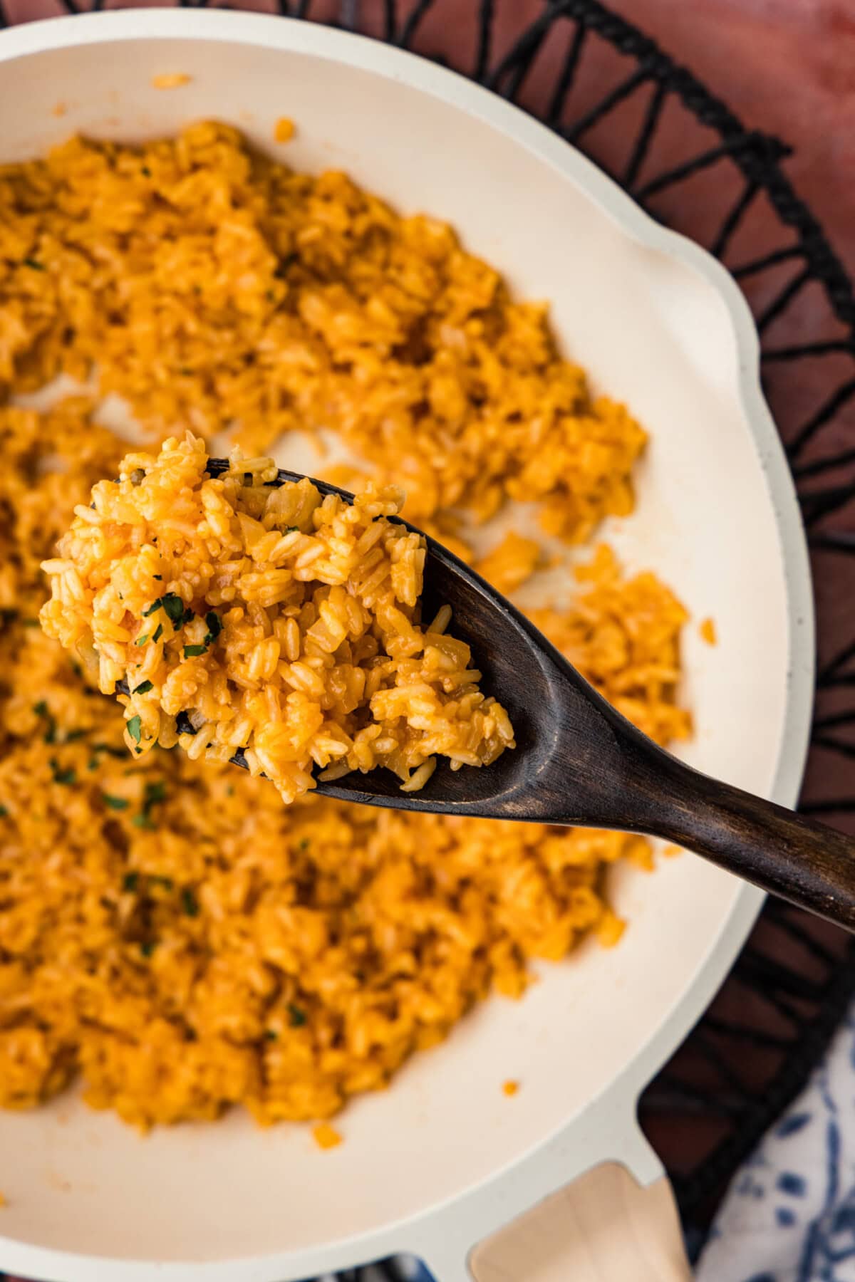 wooden spoon full of Mexican Rice