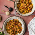 2 bowls of Mexican Rice and Beans with forks