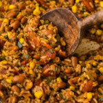 serving spoon in Mexican Rice and Beans
