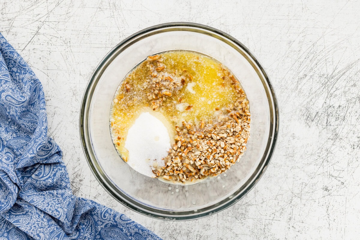 pretzels, sugar, and butter in bowl