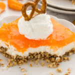 bite out of Orange Pretzel Salad on plate