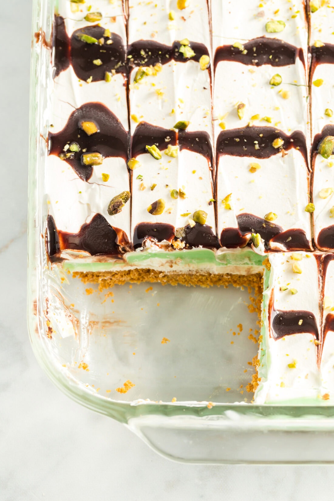 Pistachio Lush in a 13x9 pan with a slice removed