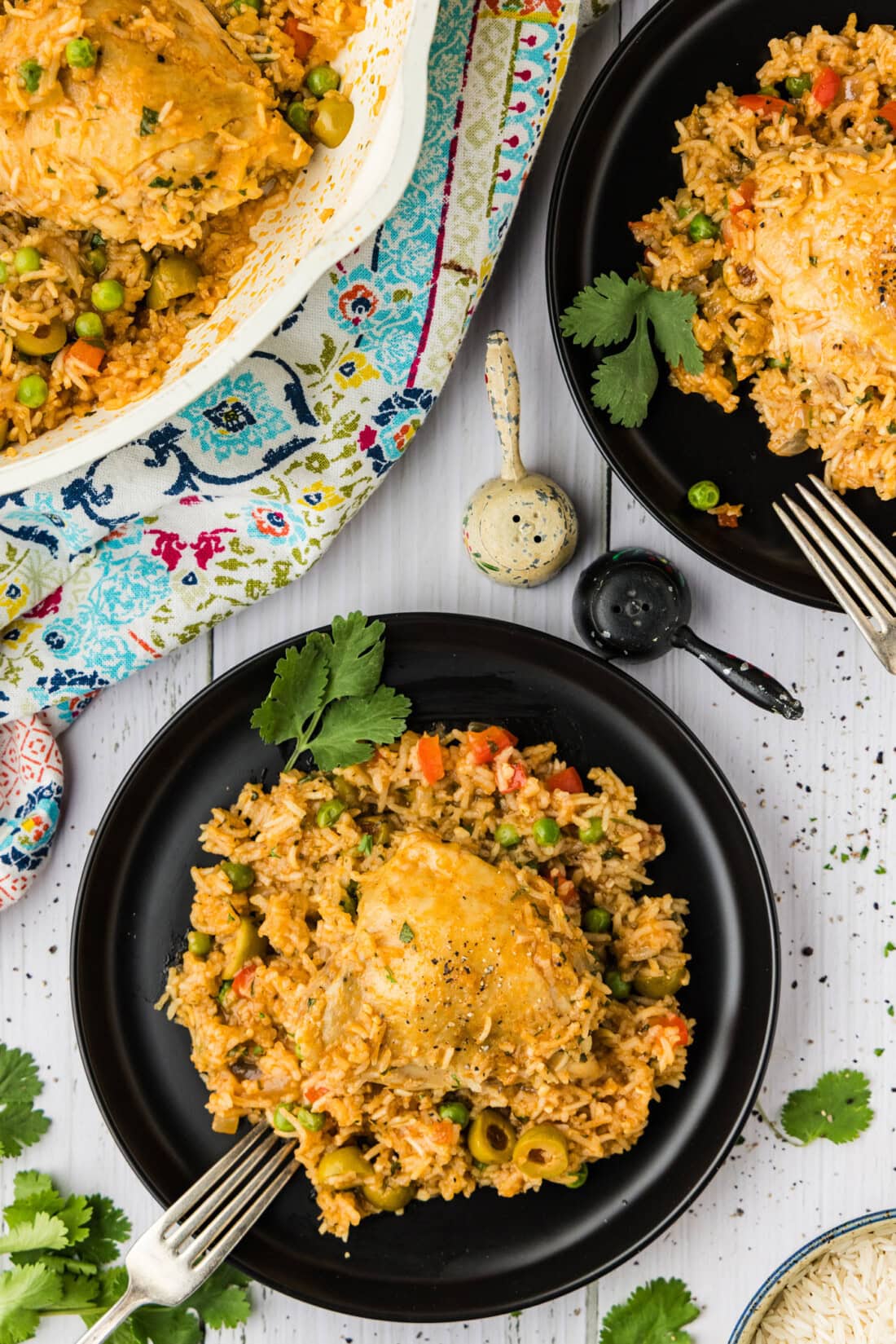 overhead photo of Arroz con Pollo on a black plate