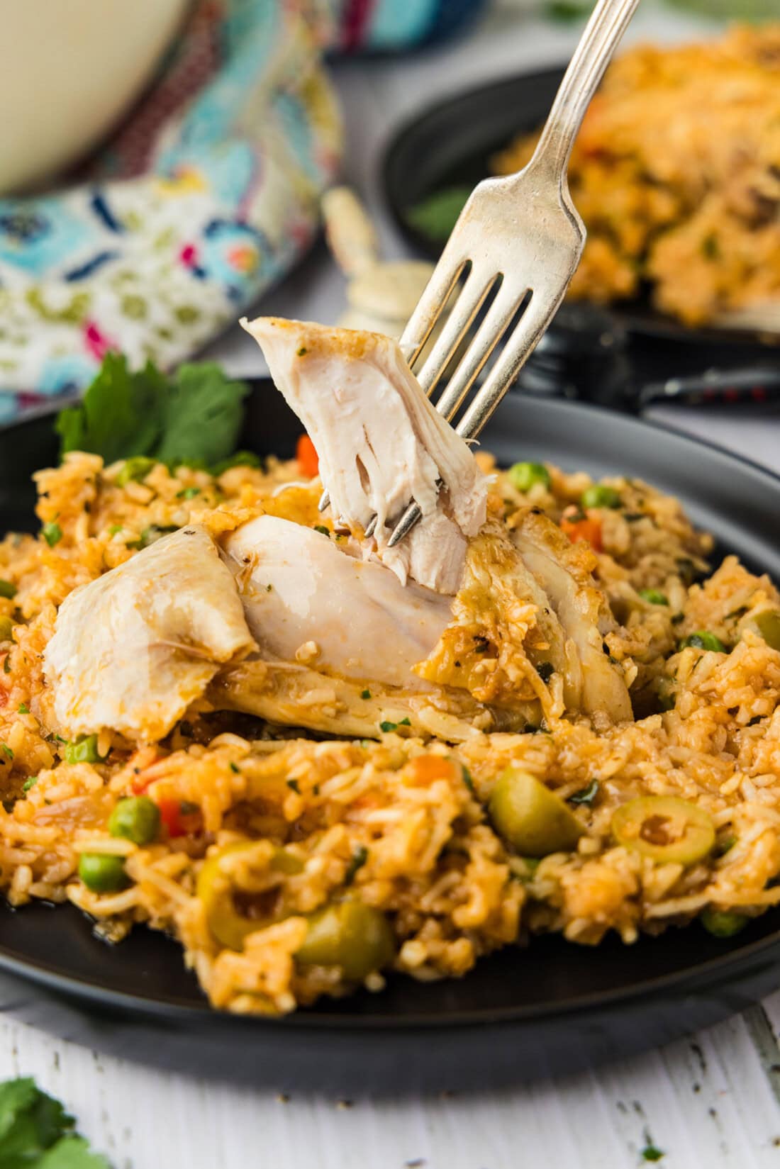 fork with cooked juicy chicken breast 