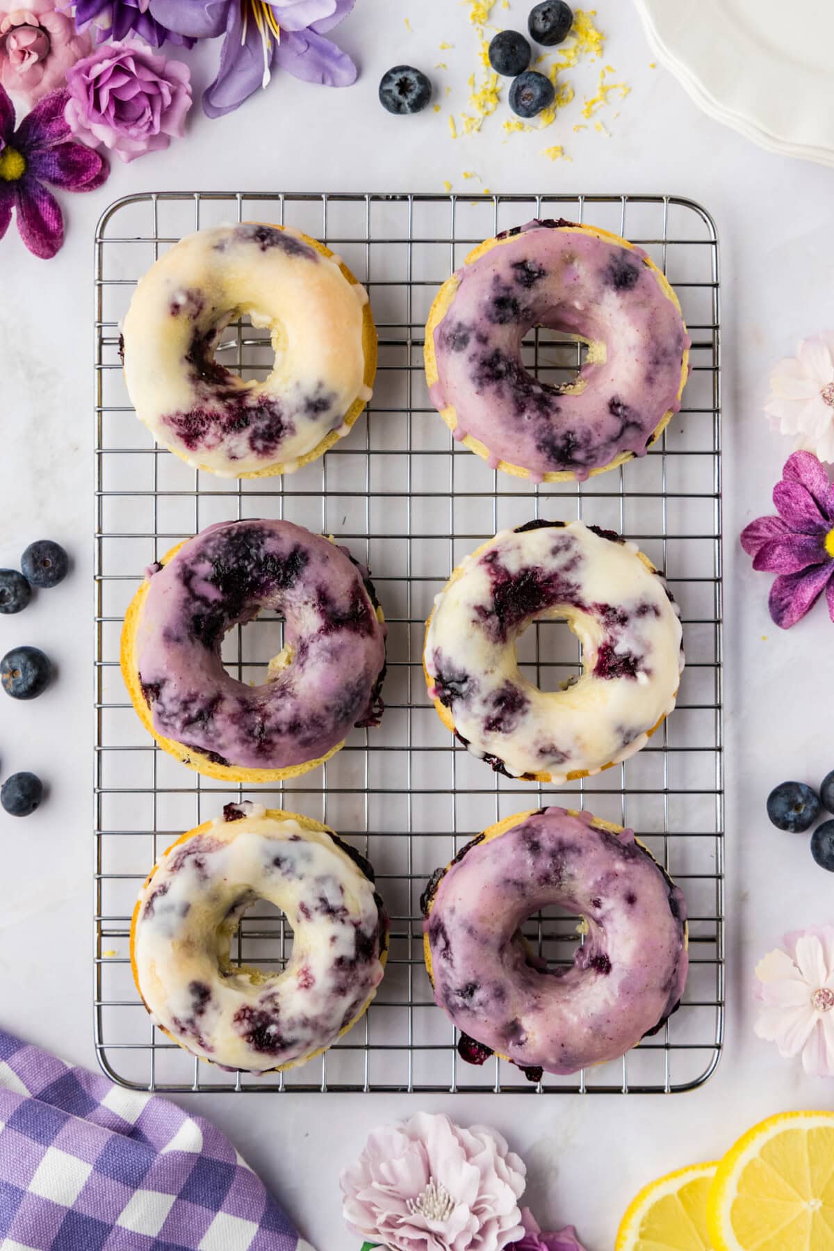 Blueberry Donuts on a wire rack