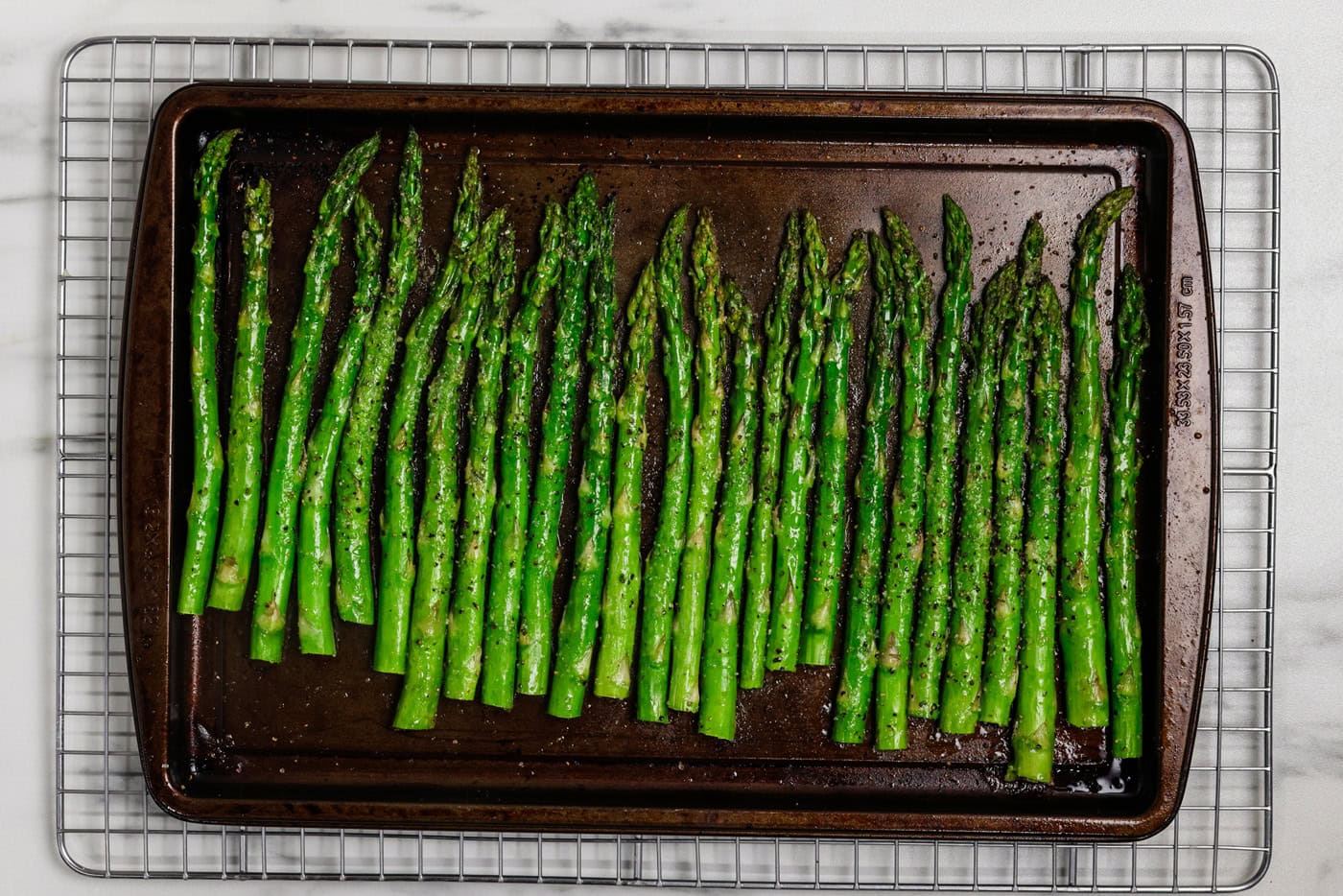 pan of cooked asparagus spears