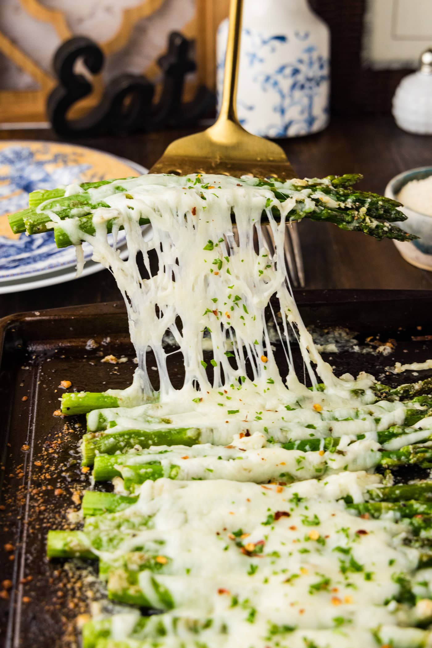 spatula lifting Cheesy Asparagus