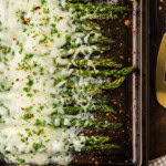 close up overhead photo of Cheesy Asparagus