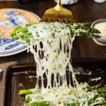 cheese pulling off spatula from Cheesy Asparagus