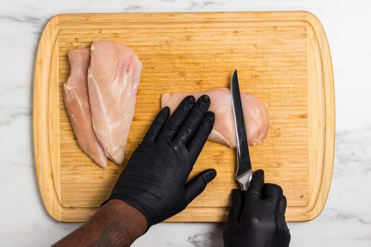 cutting slits in chicken