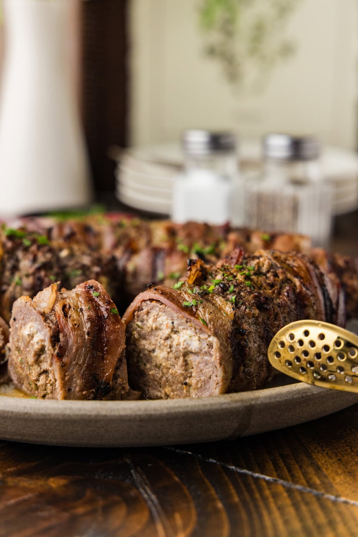 sliced Grilled Cube Steak Rollups on plate