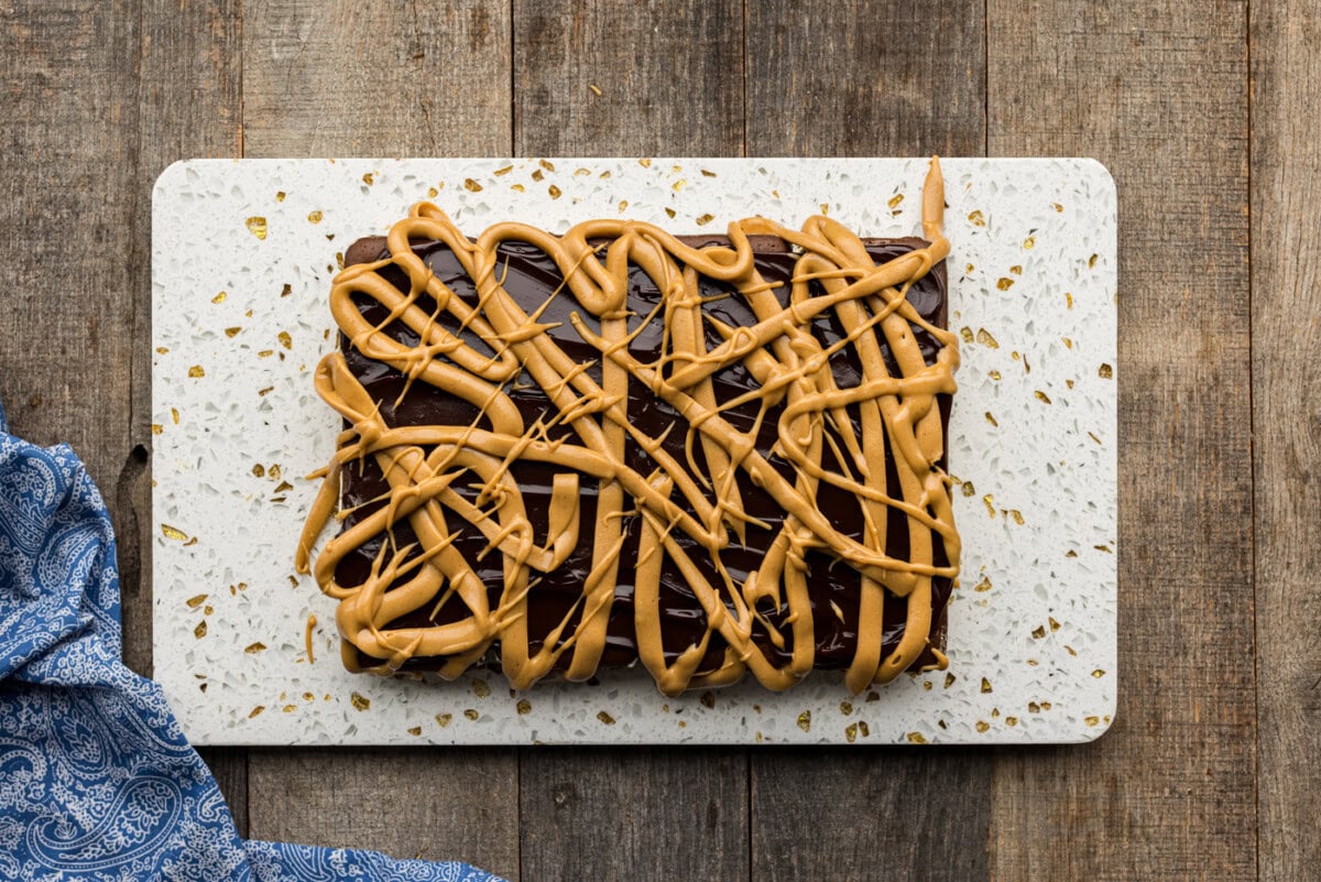 peanut butter drizzled over hot fudge sauce