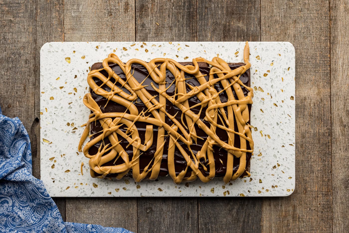 peanut butter drizzled over hot fudge sauce