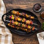 skewers of Marinated Grilled Chicken Kabobs on a platter