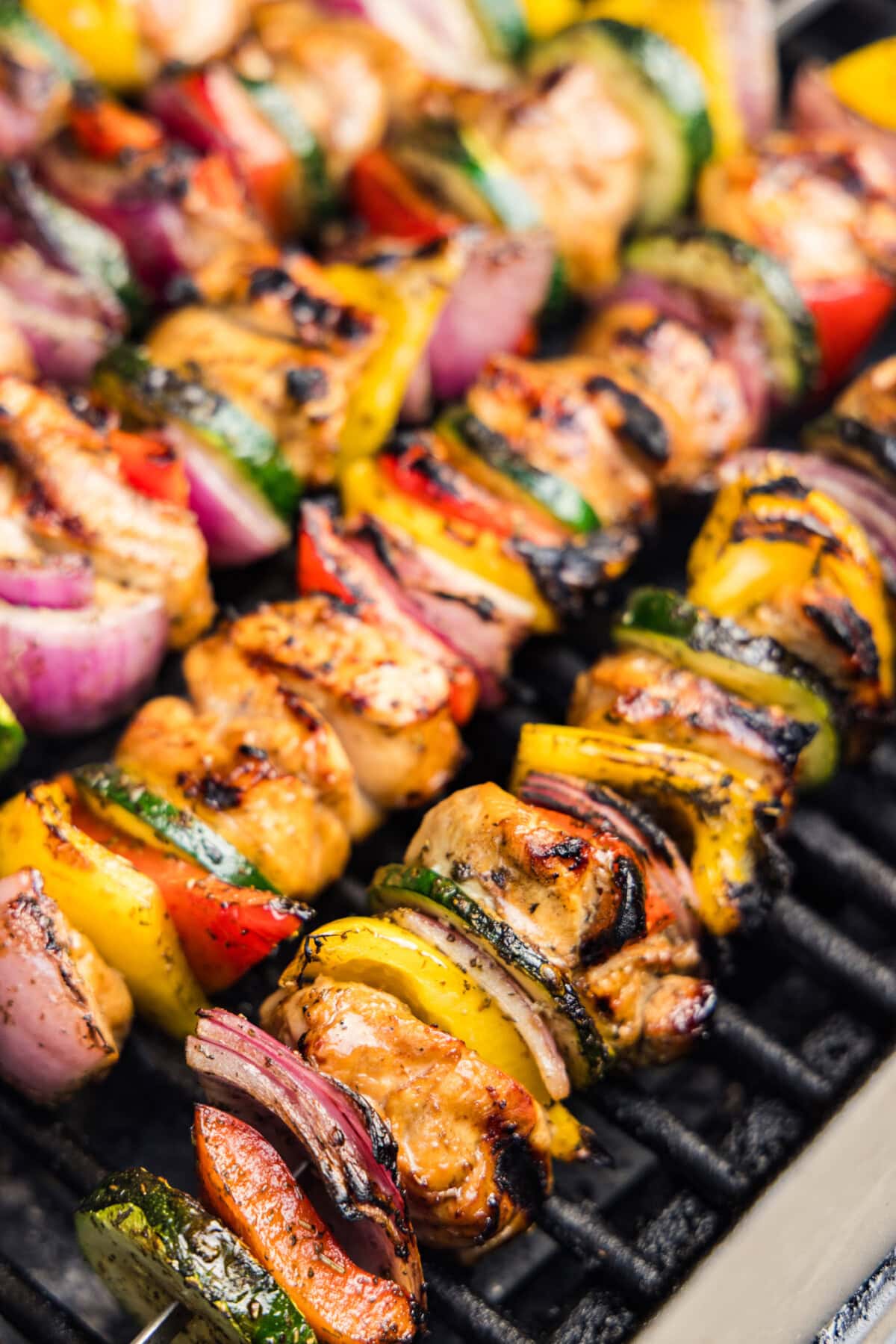 close up of Marinated Grilled Chicken Kabobs on grill