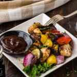 Marinated Grilled Chicken Kabobs removed from skewers on a plate