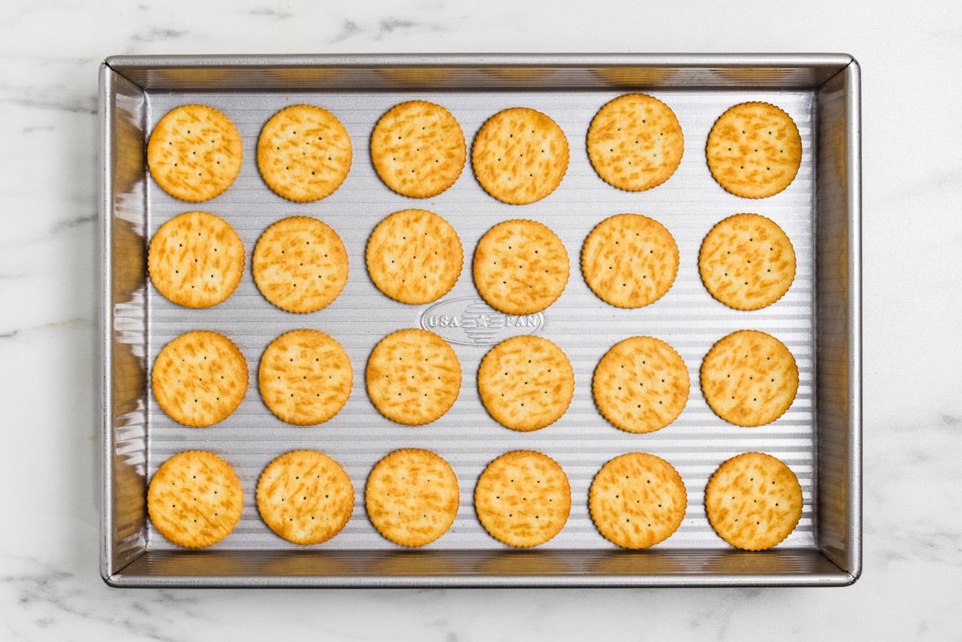 ritz crackers in a baking pan