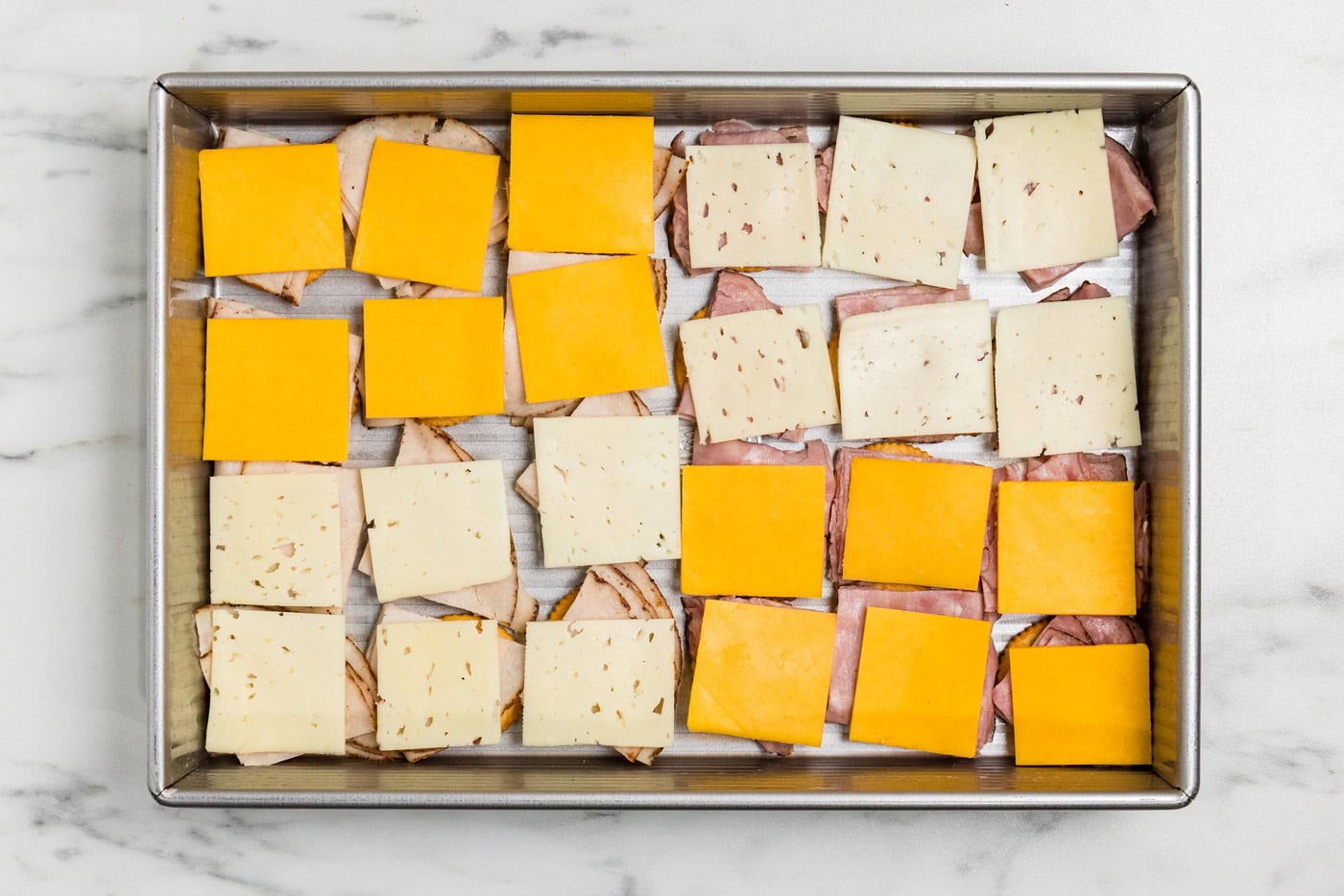 cheese topped on ritz sandwiches