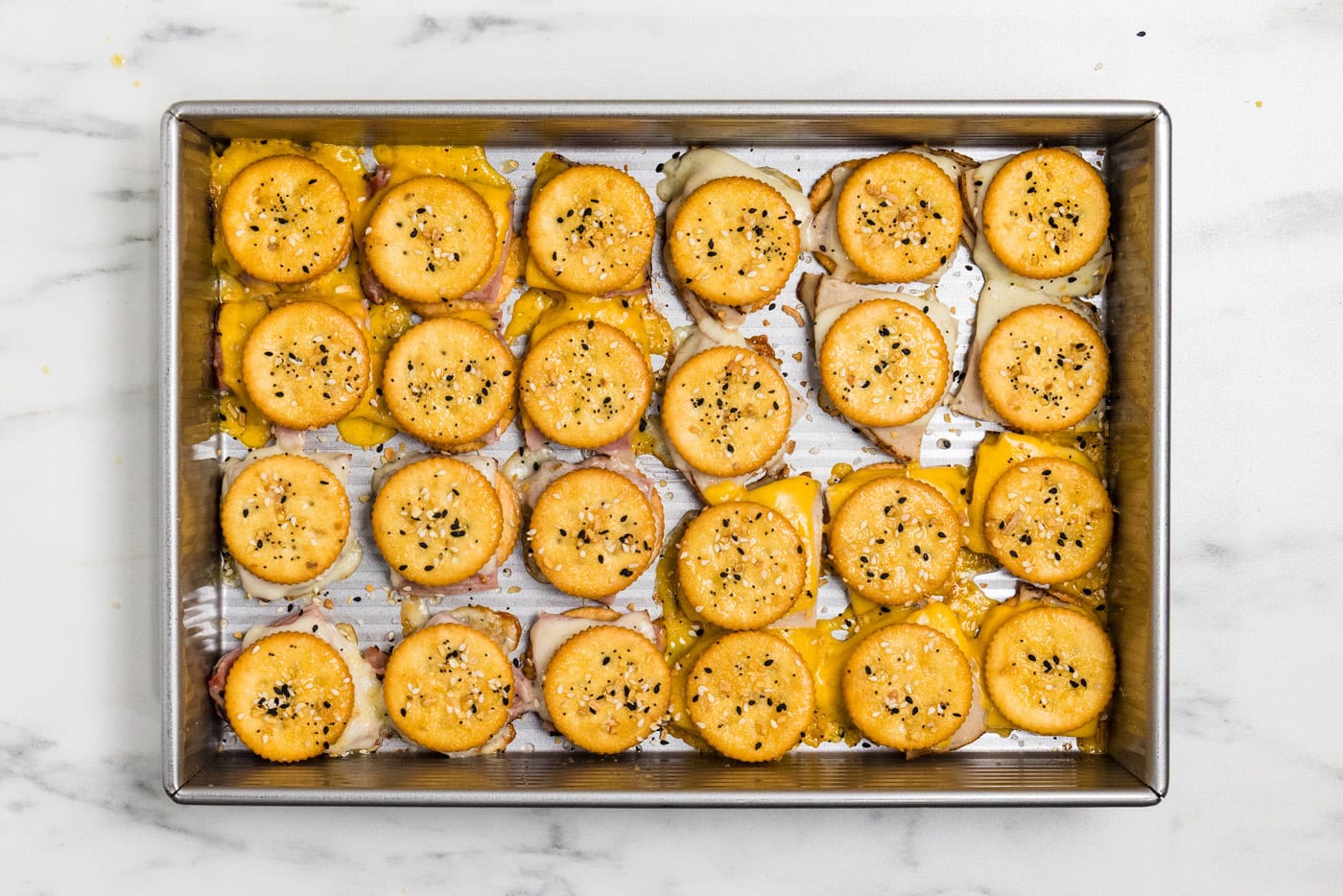 Ritz Cracker Party Sandwiches with seasoning on top