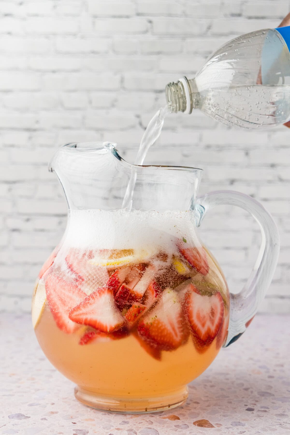 adding club soda to strawberry sangria