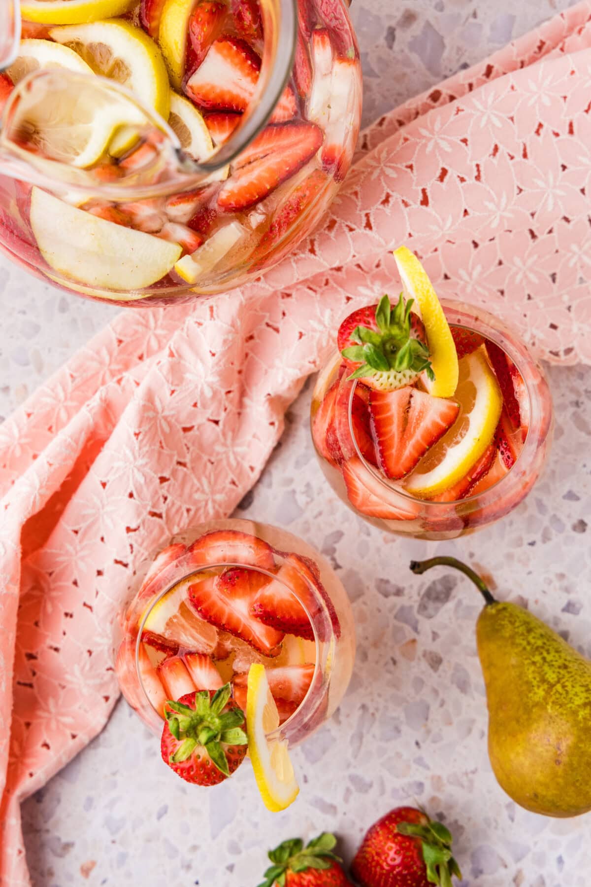 overhead photo of strawberry sangria in glasses