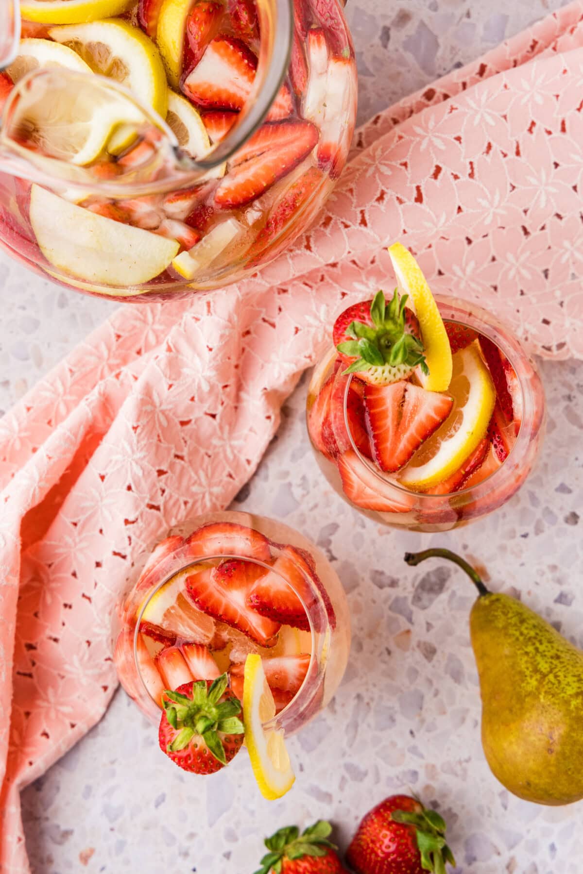 overhead photo of strawberry sangria in glasses