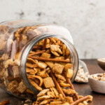 Taco Chex Mix spilling out of jar