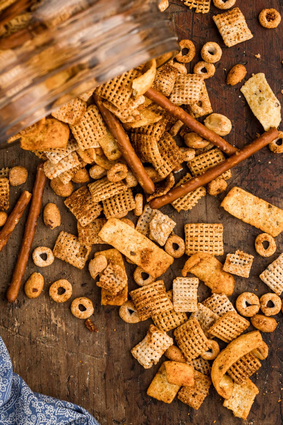 Taco Chex Mix pouring out of jar