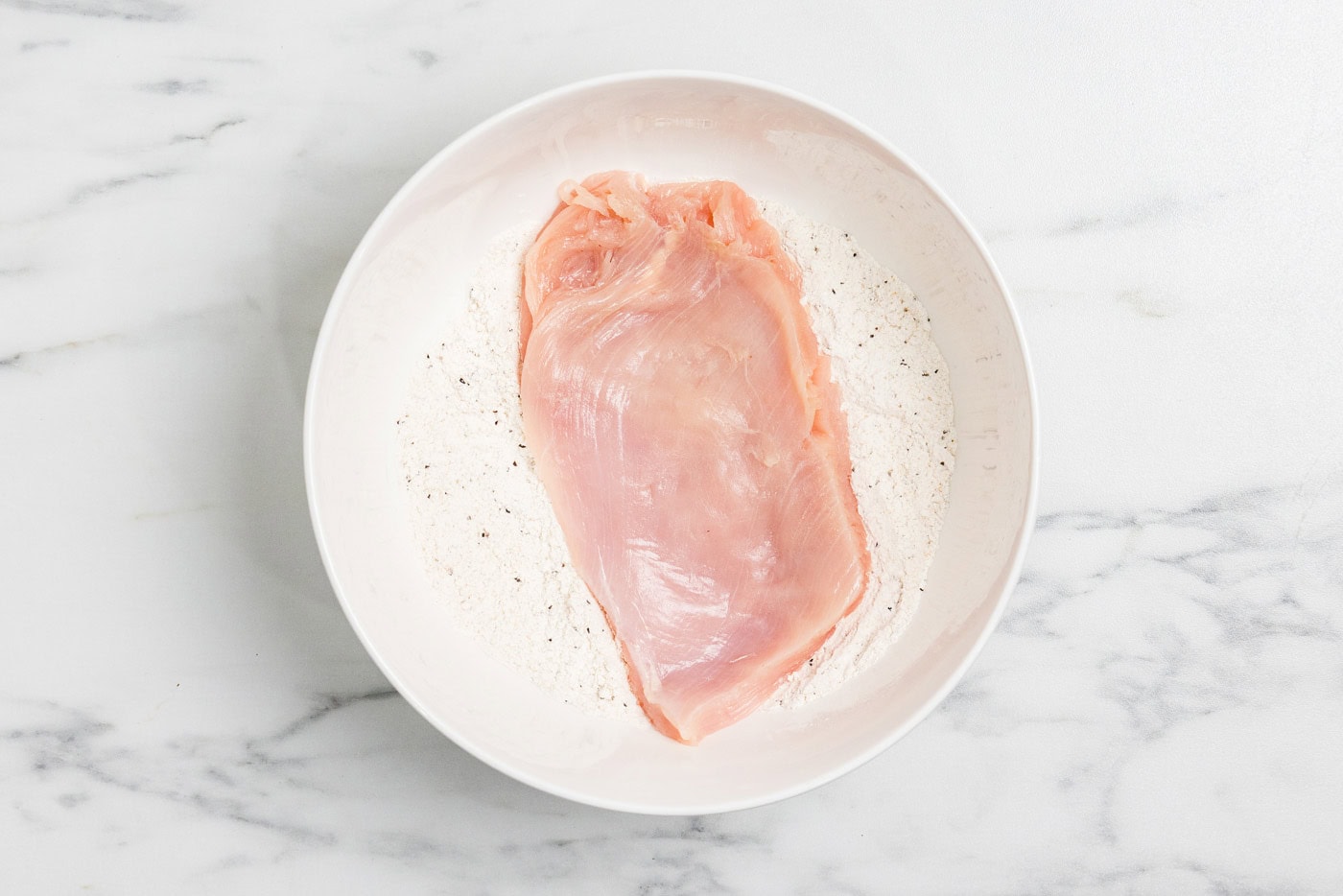 chicken cutlet in flour