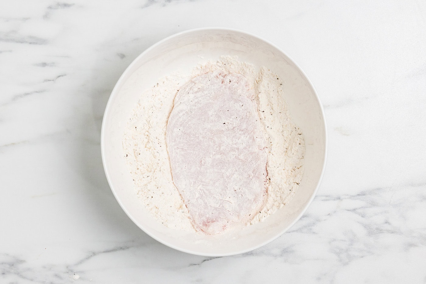 chicken cutlet dredged in flour