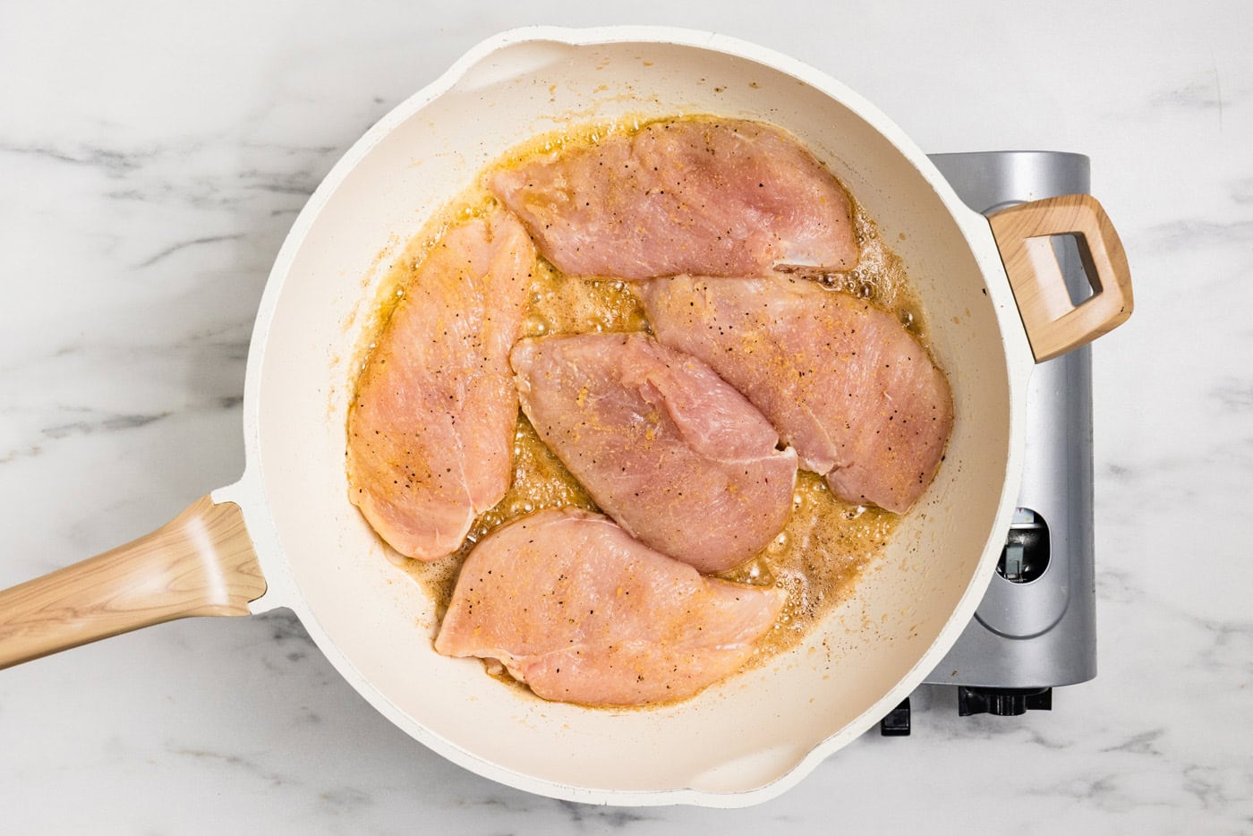 chicken breasts in skillet