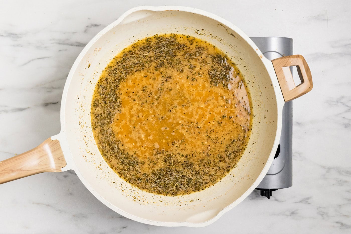 sauce ingredients in skillet