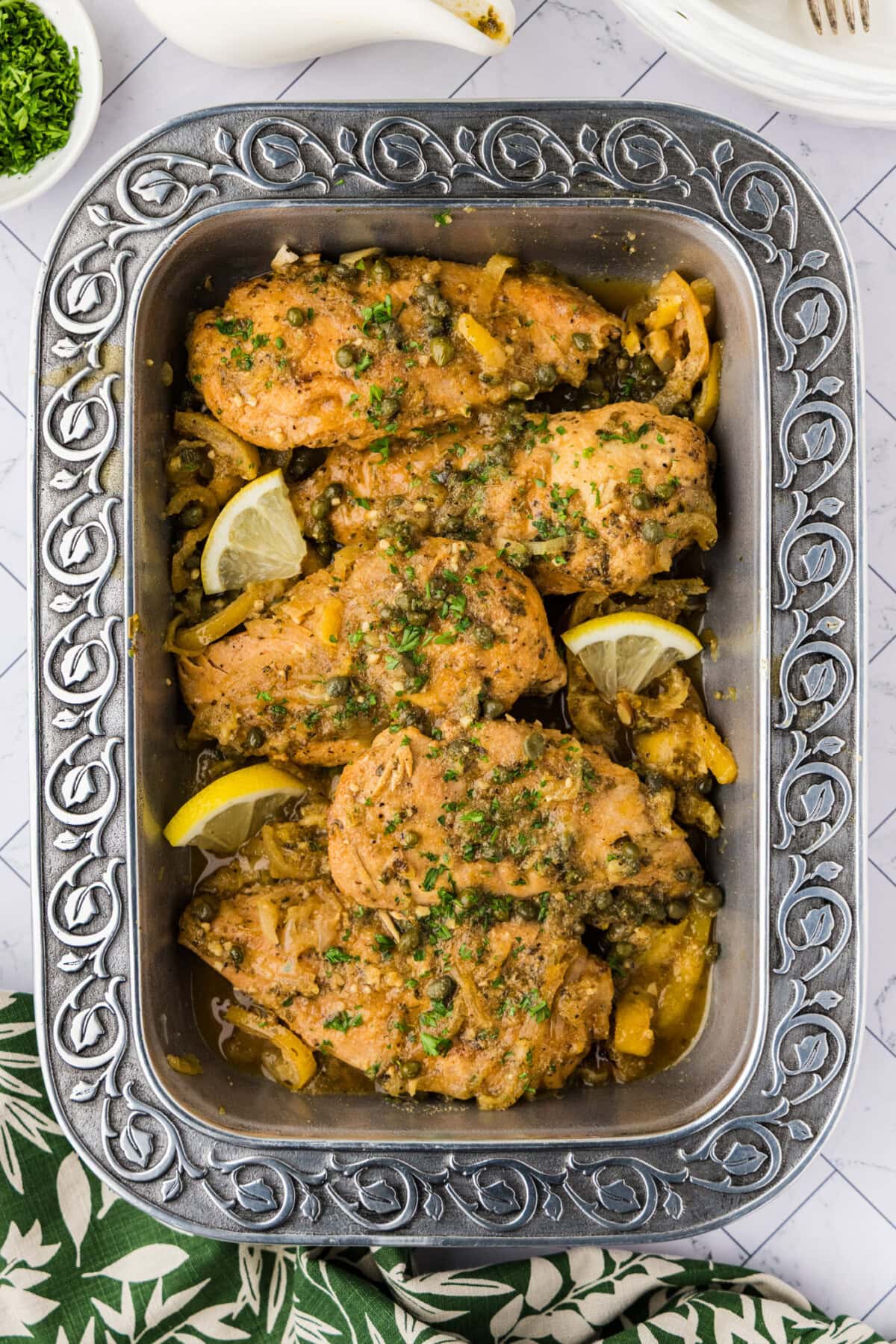 Crockpot Lemon Chicken breasts in tray