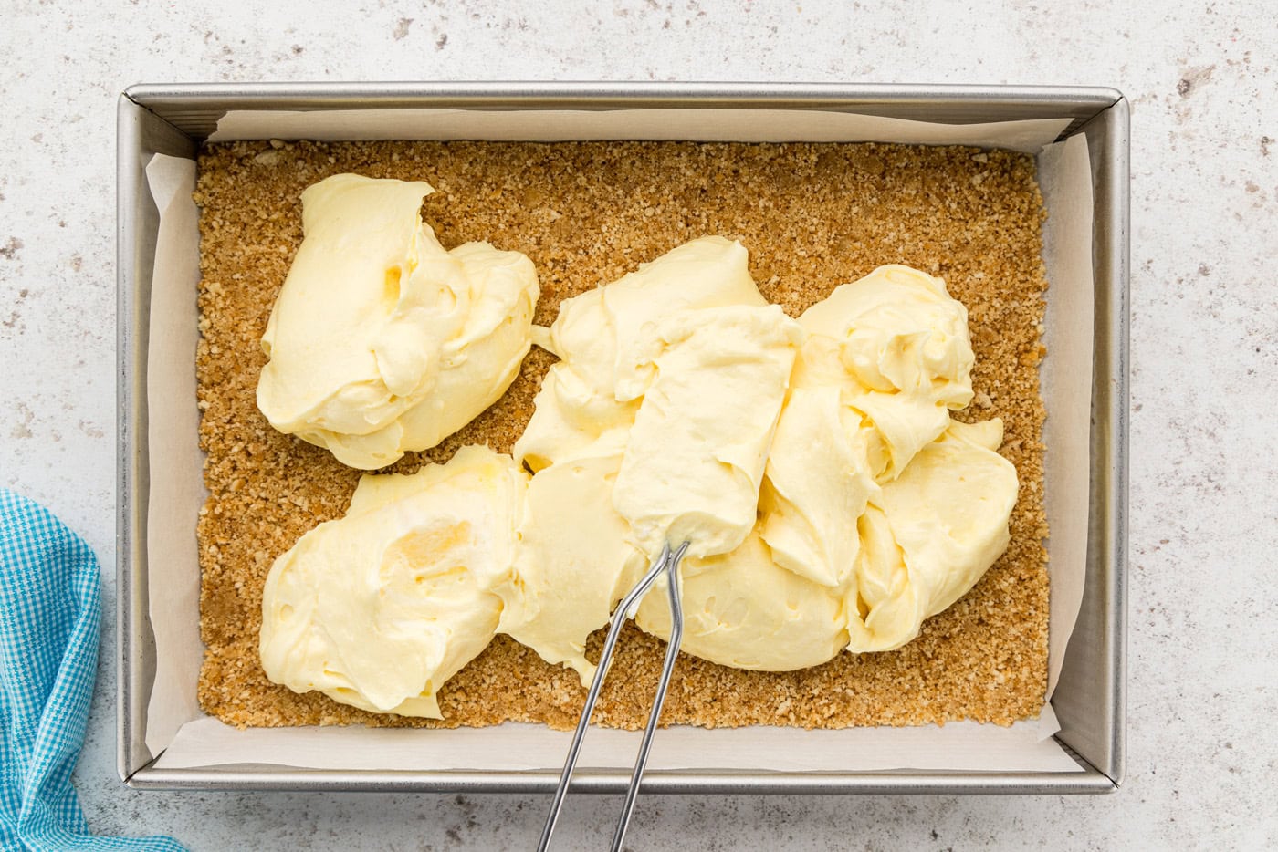 whipped cream layer over graham crust