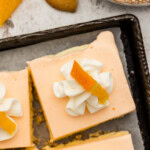 close up overhead of a frosty orange dream square sherbet dessert