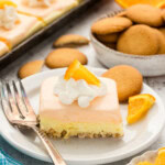 slice of Orange Sherbet Dessert on plate with fork