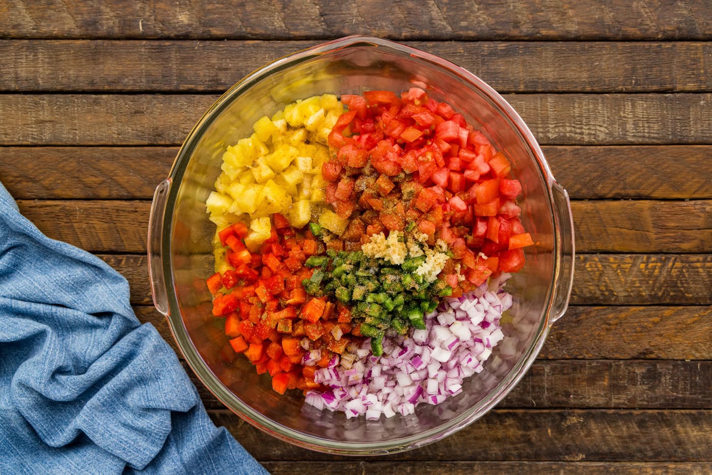 ingredients for Pineapple Salsa in a glass bowl