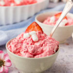 Strawberry Fluff Salad in a small bowl with a spoon