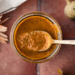 overhead of spoon lifting Homemade Baja Citrus Marinade