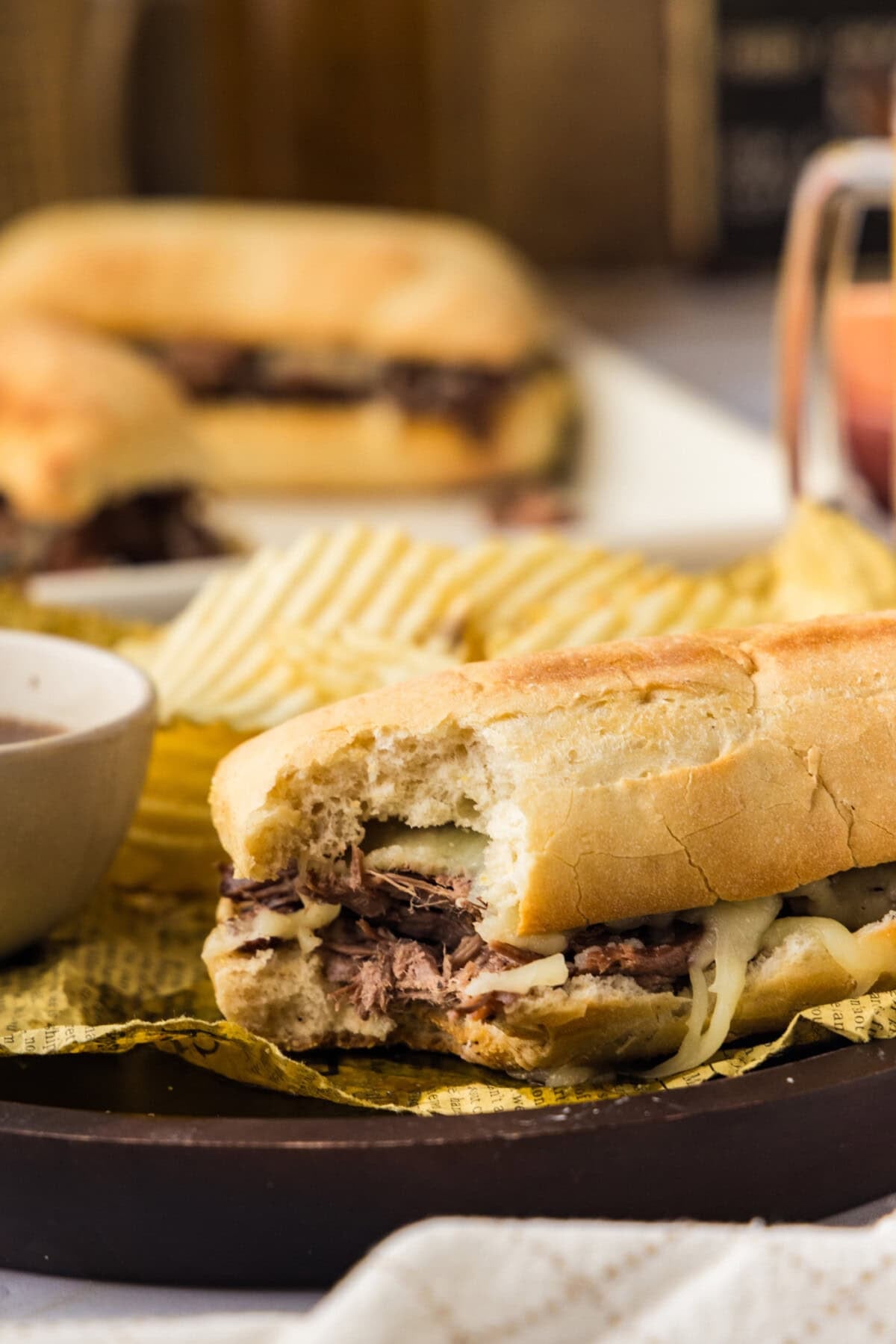 bite out of a Crockpot French Dip Sandwich