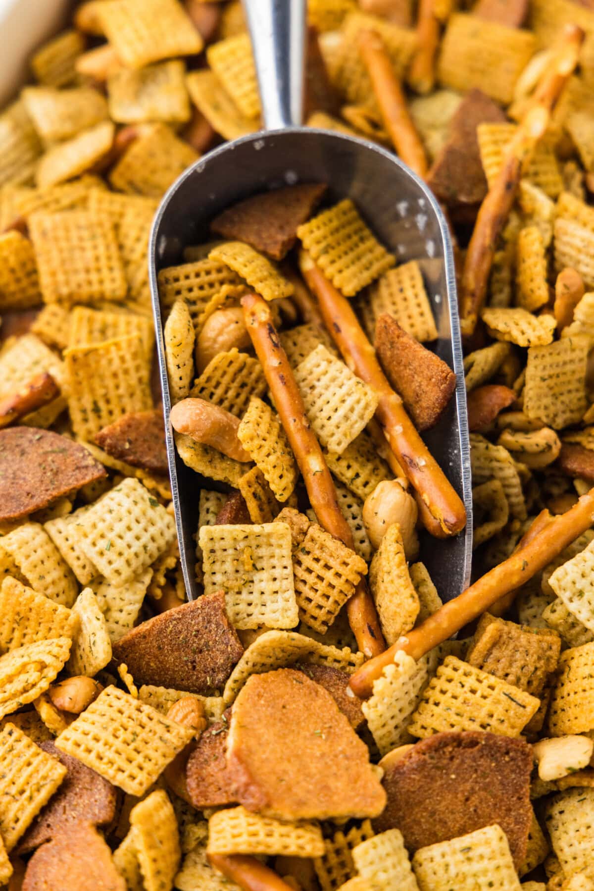 scoop in a pan of Dill Pickle Chex Mix