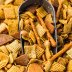scoop in a pan of Dill Pickle Chex Mix