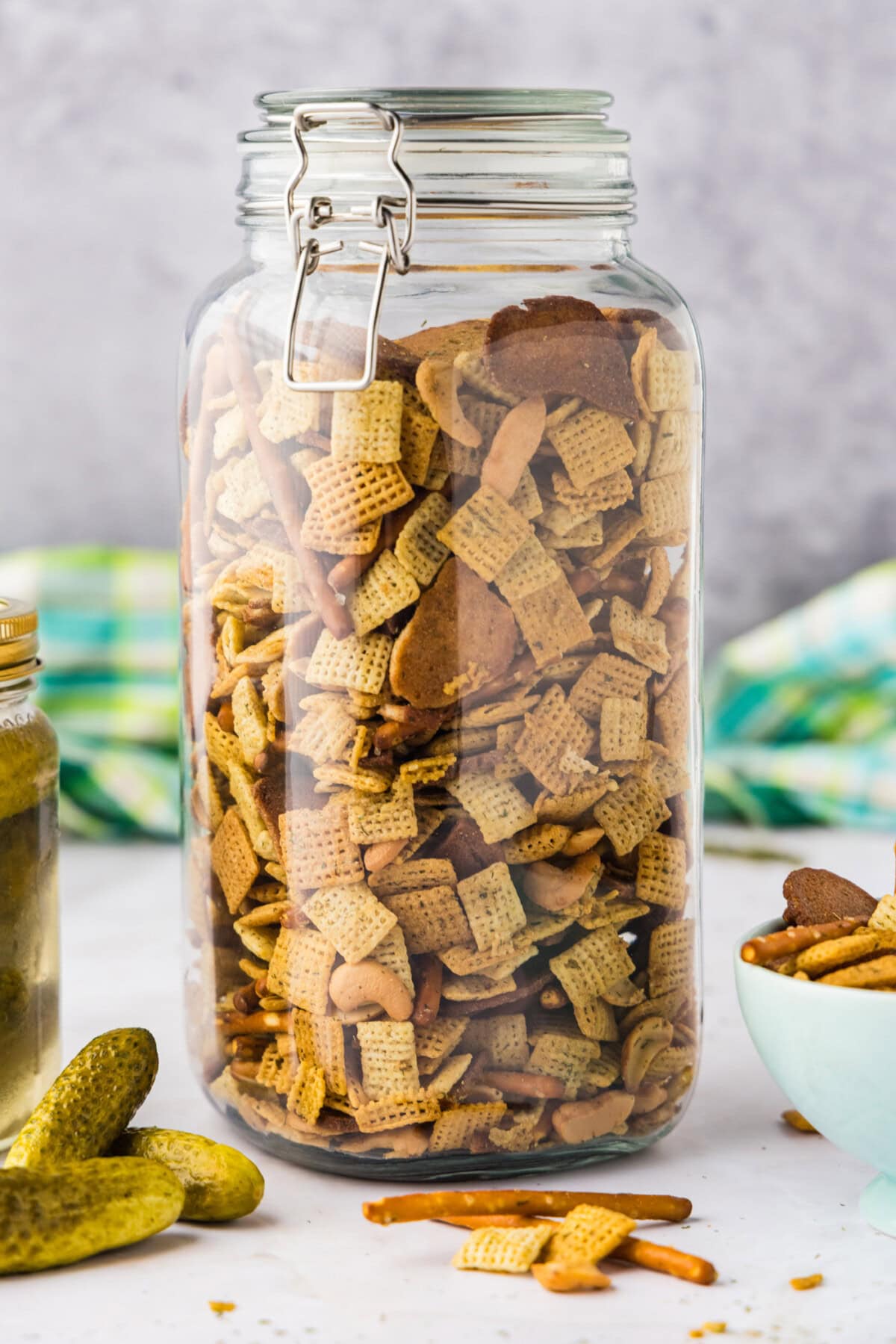 big glass container of Dill Pickle Chex Mix