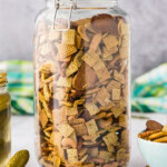 big glass container of Dill Pickle Chex Mix