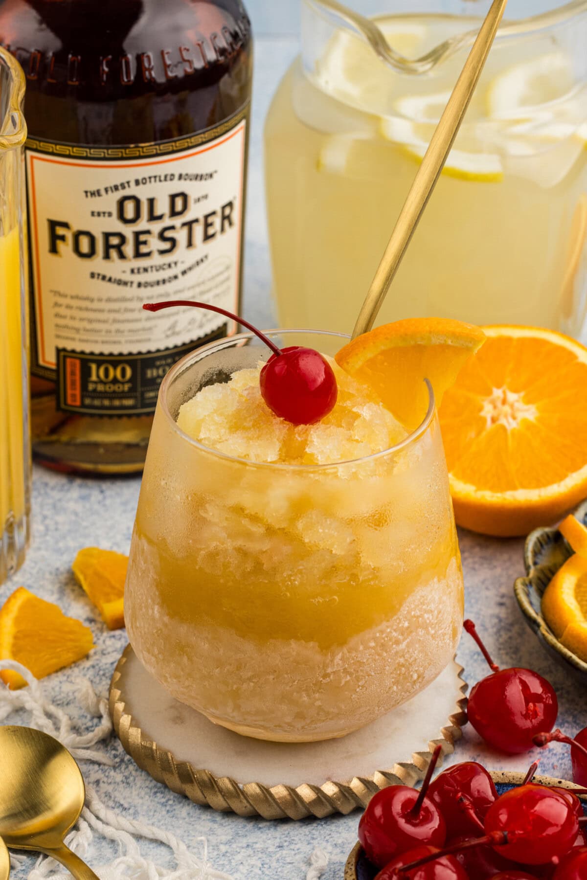 glass of Easy Bourbon Slush with a cherry garnish