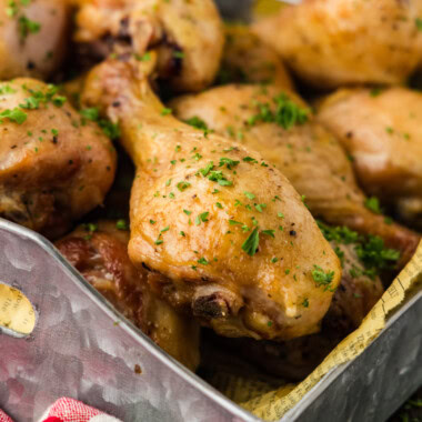 smoked chicken drumsticks in a metal tray